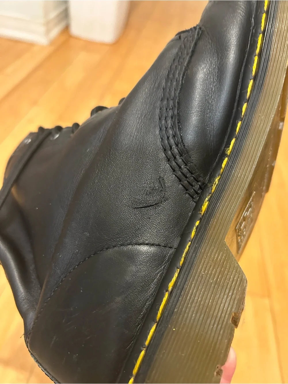 Dr. Martens Black Leather 8-Eye Lace-Up Boots with Yellow Stitching